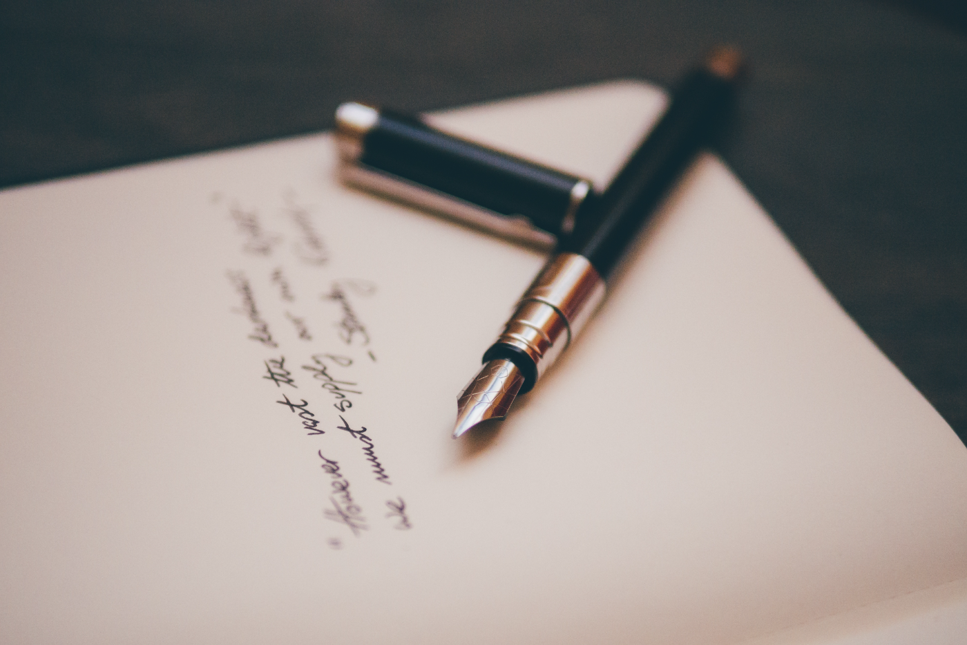 A notebook and fountain pen